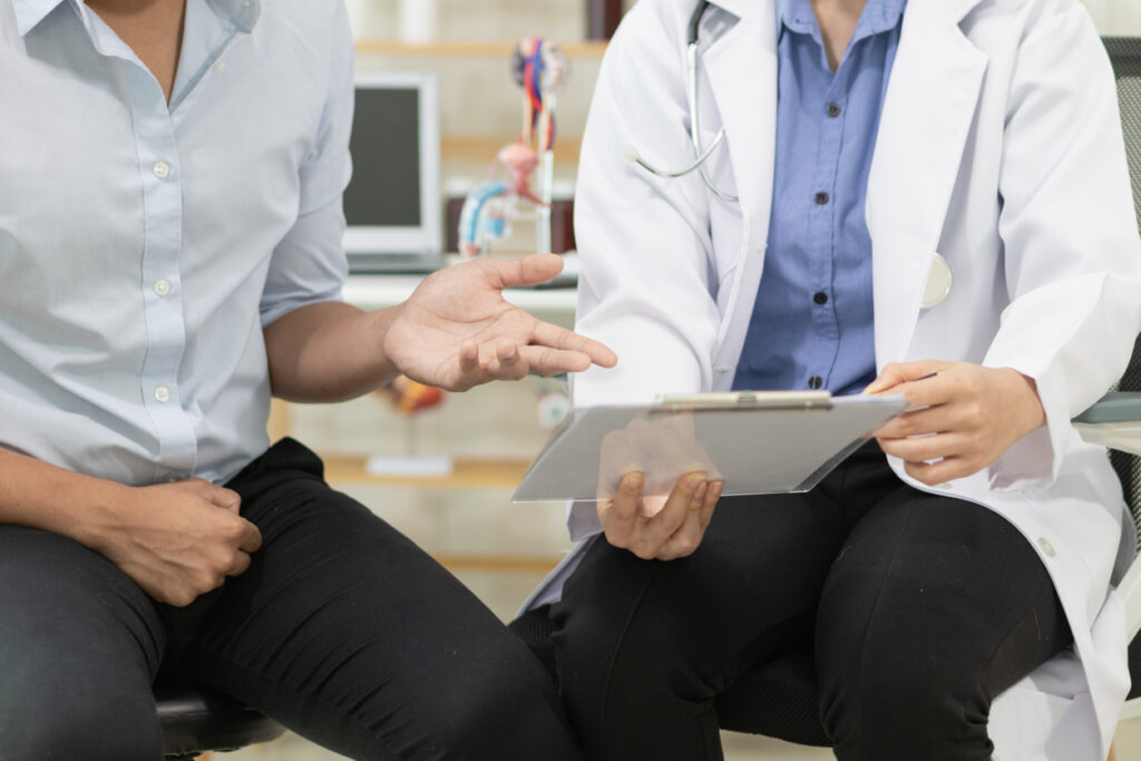 A young man was speaking with a doctor regarding a PSA test for prostate issues.